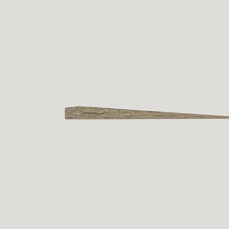 Long thin tapered wood leg with natural grain texture on light grey background