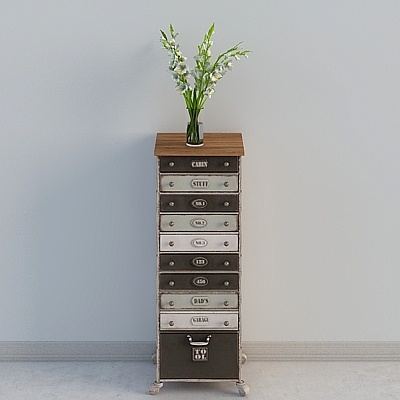 Tall wooden cabinet with mixed drawers and silver handles on grey background