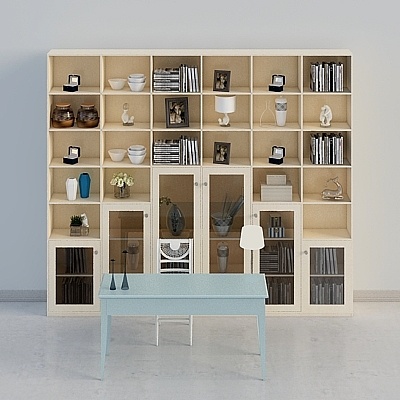 Large light wood wall unit with glass doors and desk on white background