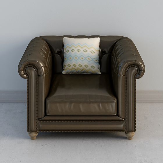 Classic brown leather armchair with patterned pillow and nailhead trim on grey background