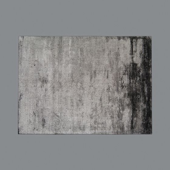 Modern rectangular grey area rug with abstract black pattern and textured surface on grey background