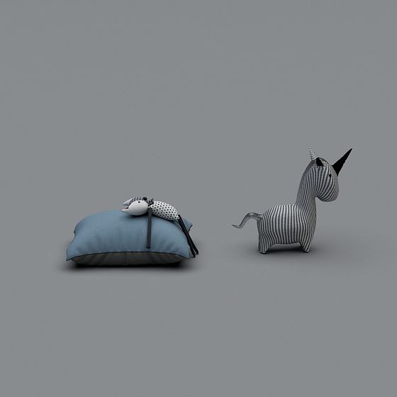 Blue cushion with dog toy and checkered unicorn on grey background