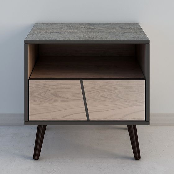 Modern nightstand with grey stone top and light wood drawers on white background