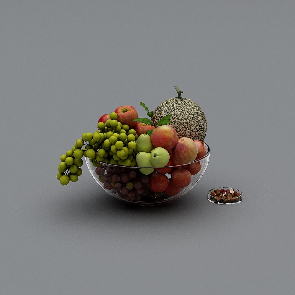 Clear glass bowl with fresh fruits and nuts on grey background