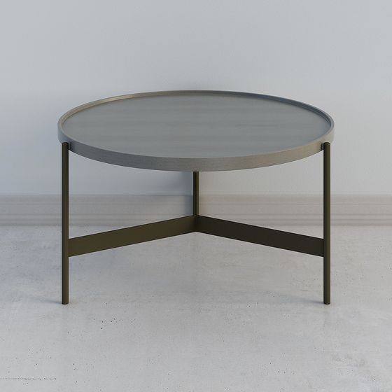 Modern round coffee table with grey top and dark metal legs on white background