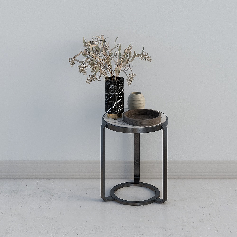 Modern round side table with white marble top and black metal frame on grey background