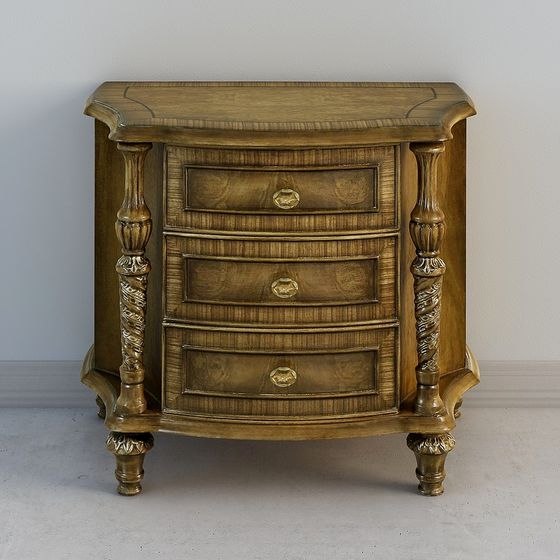 Classic brown wooden cabinet with three drawers and carved legs on white background